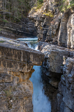 Canada, Alberta, Banff National Park.   Surging water of the Johnston Creek in the Johnston Canyon, a popular hike for park visitors.