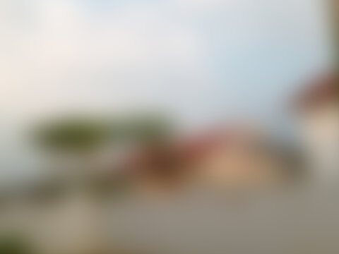 Abstract intentionally blurred background of outdoor landscape and building