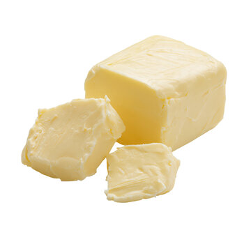 A block of butter with two pieces cut off isolated on a transparent background
