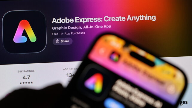 Smartphone showing Adobe Express creative design application against computer monitor displaying product page.