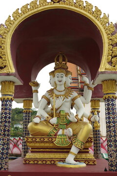 Golden statue of a four faced Brahma at a Thai temple