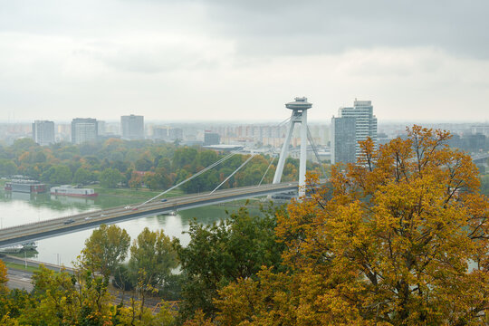 Bratislava Skyline with the UFO Tower and the SNP Bridge in Autumn.