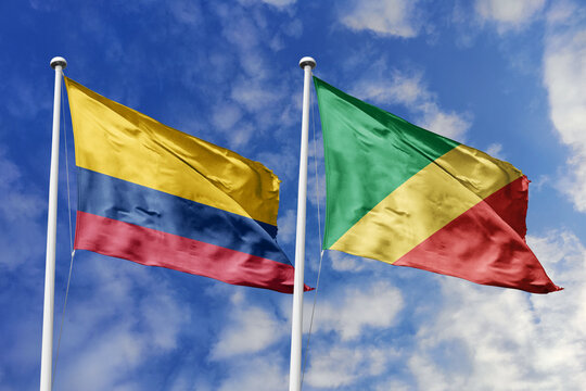 Colombia and Republic of the Congo flags waving in a clear blue sky, and a shared vision of unity for a sustainable future.
