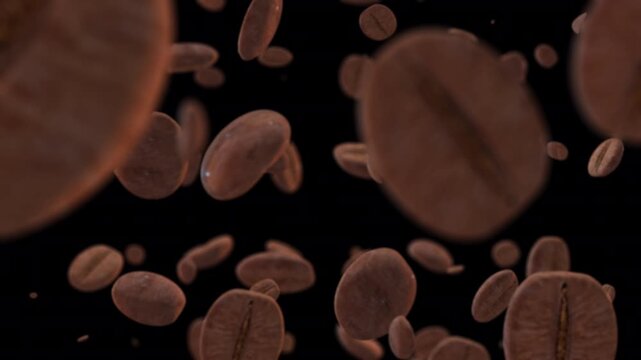 Roasted coffee beans falling and flying in the air on a black background with depth of field