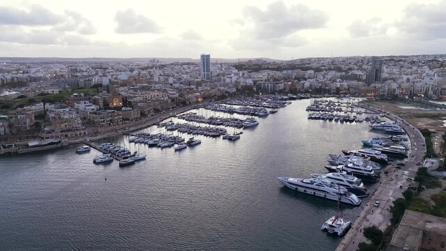 Msida Yacht Marina at Dusk with Sunset in Malta Aerial View