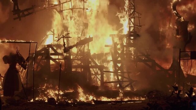 Traditional Bonfires Burning on the Streets of Valencia, Spain at Night
