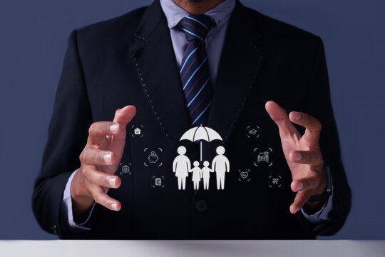 Business Person Showing Holographic Family Life Insurance Interface