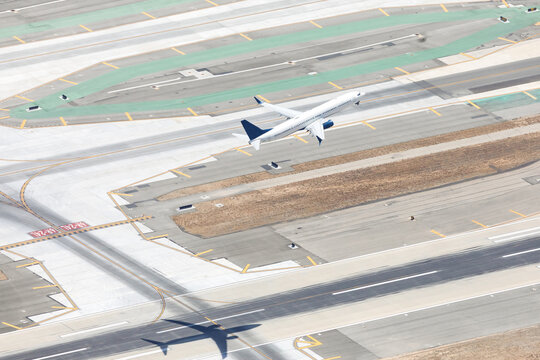Commercial jet taking off from an airport runway