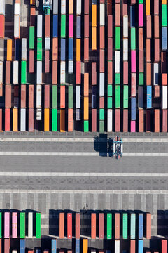 Aerial top down view of colorful shipping containers at a port
