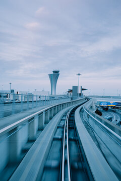 Point of view from a fast moving airport sky train