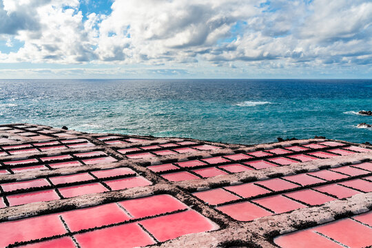 Vivid pink salt pans on the coast of La Palma Canary Islands