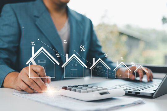 Real estate investment concept, home loan application, businessman calculate investment buying-selling, real estate marketing, creating stability in life, real estate rental