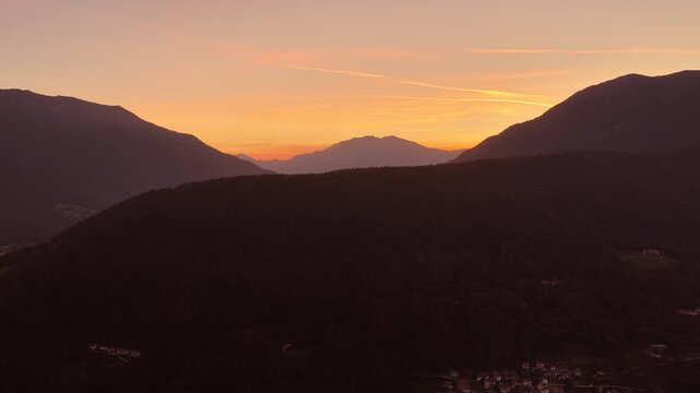 Dolomite mountain landscape glowing dramatically at sunset