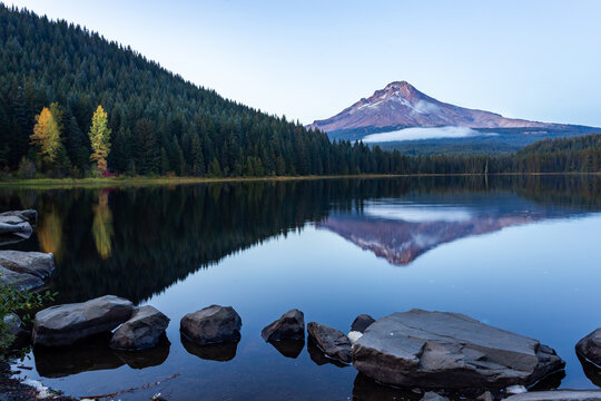 Trillium Lake calm water reflecting Mt. Hood and clouds in autumn
