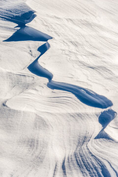 Abstract snowdrift pattern in South Tyrol Italy