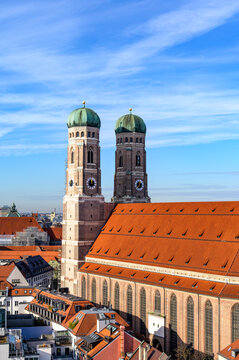 The Frauenkirche cathedral stands over the rooftops of Munich