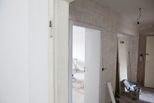 An empty room undergoes renovation for moving house
