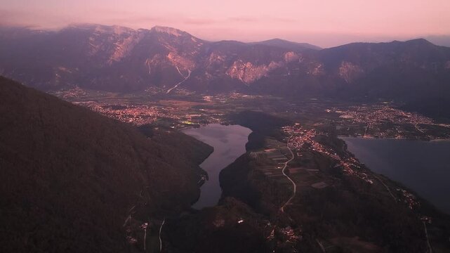 Twilight aerial landscape of Lake Levico and surrounding Alpine