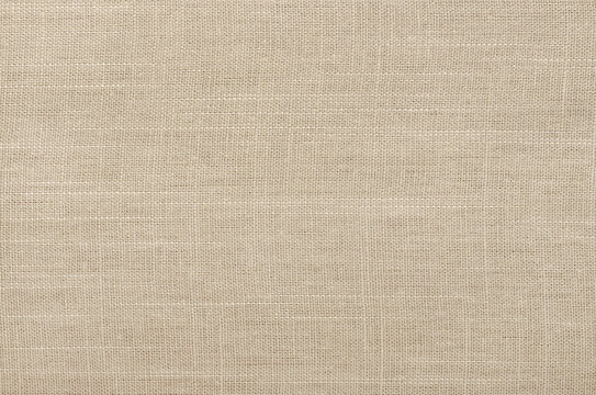 Brown linen fabric texture background, seamless pattern of natural textile.