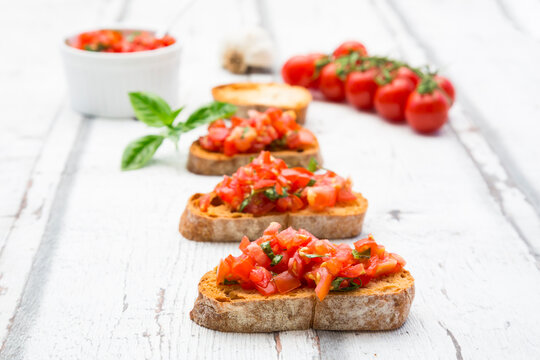 Bruschetta with tomato, basil, garlic and white breah