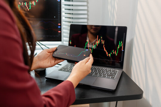 Professional investor monitoring financial markets and analyzing investment opportunities in a modern office, representing stock trading, market research, portfolio management.