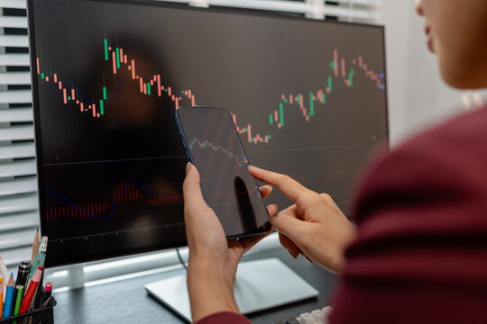 Professional trader monitoring financial markets and analyzing investment opportunities across multiple trading platforms, representing stock analysis, market research.