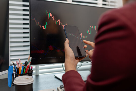 Professional trader monitoring financial markets and analyzing investment opportunities across multiple trading platforms, representing stock analysis, market research.