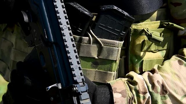 Modern soldier in camouflage uniform. The military concept