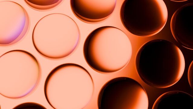 Close-up of glossy orange circular shapes
