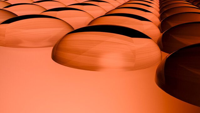 Orange 3d rendered spheres arranged in a pattern