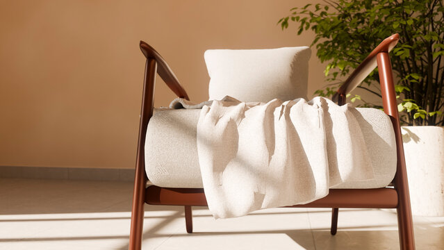 Brown armchair with cushion and throw blanket beside indoor plant