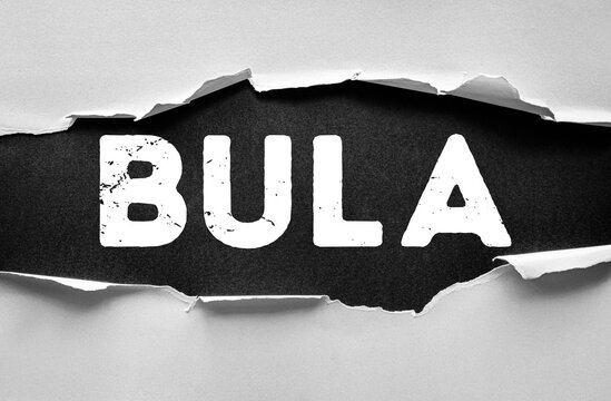 Text BULA meaning hello or welcome in Fijian language displayed on torn paper background. Concept for greeting, hospitality, cultural tradition, travel, tourism and warm invitation