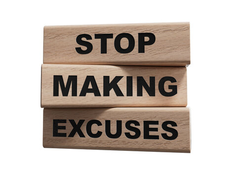 wood cubes and a wooden block with the text STOP MAKING EXCUSES. wood cubes. Copy space.Supports PNG files with transparent backgrounds.