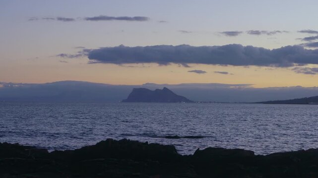 Rock of Gibraltar Silhouette at Dusk over Mediterranean Sea