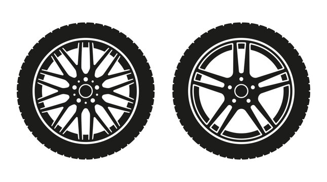 Two black and white car wheels with detailed tire treads and spoke designs