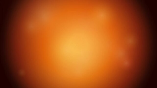 Abstract orange gradient background with soft glowing light motion
