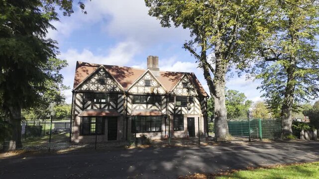 Restored 16th-Century Golden Lion Pub in Cannon Hill Park, Birmingham, UK.
Historic exterior view of the restored Golden Lion, a distinctive 16th-century timber-framed pub in Cannon Hill Park.