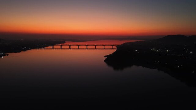 Aerial view of a soothing sunset over the Brahmaputra River in Guwahati, Assam