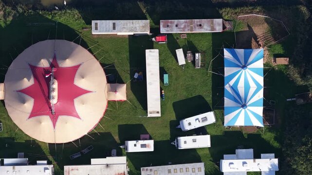 Aerial View of Circus Tent Surrounded by Trailers and Caravans