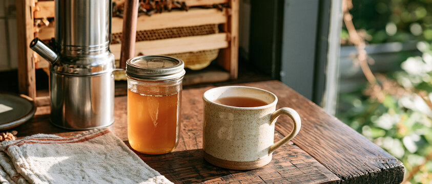 Coffee Preparation Setup with Wooden Table and Mugs