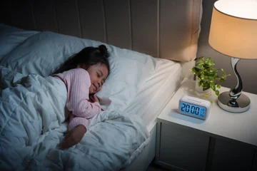 preschool child girl sleeping on bed and sweet dream at night © geargodz