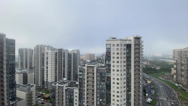 Dense fog over high-rise residential buildings in St. Petersburg.