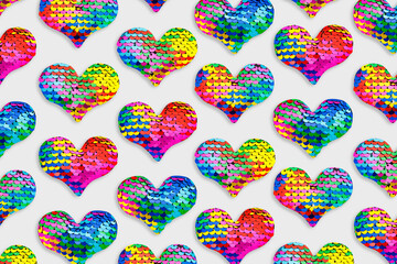 Creative pattern of shining colored hearts of sparkling sequins, 14 february Valentines day holiday greetings, glamour festive concept, pop art style, shine sequils heart as fish scale, mermaid style. © yrabota