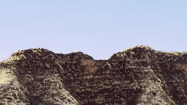 Tuff, a relatively soft, porous rock that is usually formed by the compaction and cementation of volcanic ash or dust. Diamond Head Crater. Oahu, Hawaii. 