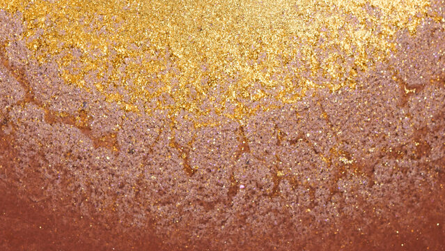 Mixing different colored alcohol inks in macro view at an art studio