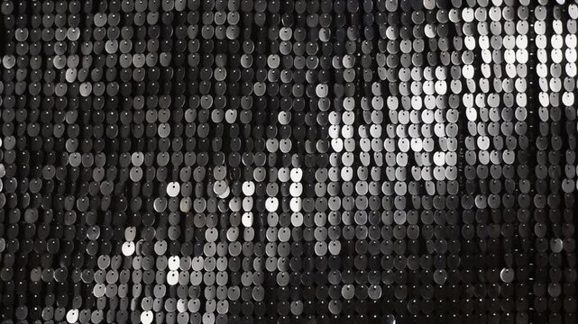 Sequins shimmering as light moves