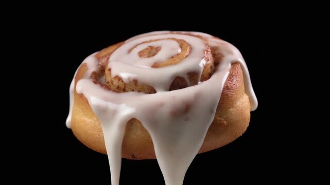 Icing melting into a cinnamon roll