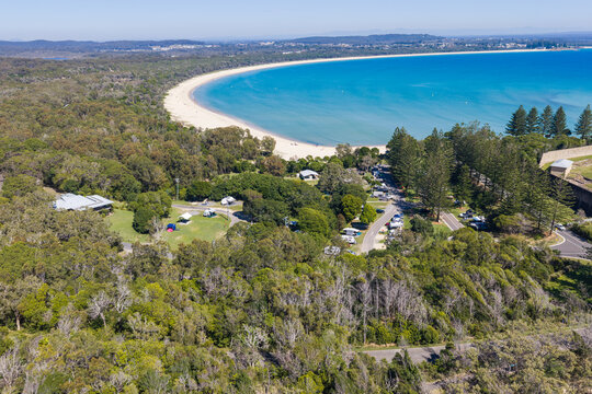 Aerial view across Trial Bay Campground and Front Beach at South West Rocks on the Mid North Coast of New South Wales, Australia.