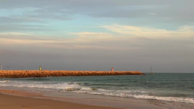 Tropical summer beach, sunrise over sea horizon, waves and beach shore video