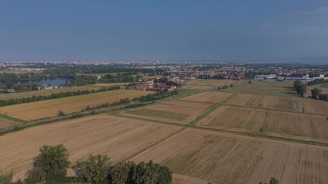 Aerial panorama of cultivated fields near Mediglia, Lombardy, showing organized agricultural land use in northern Italy.